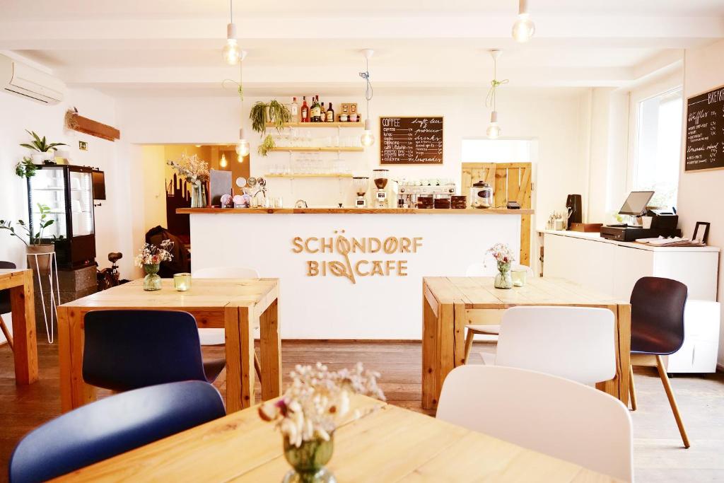 Café with wooden tables and barista bar